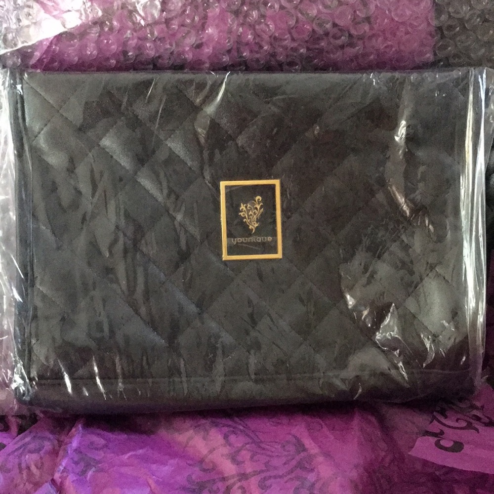 Younique brand new beautiful black and purple bag